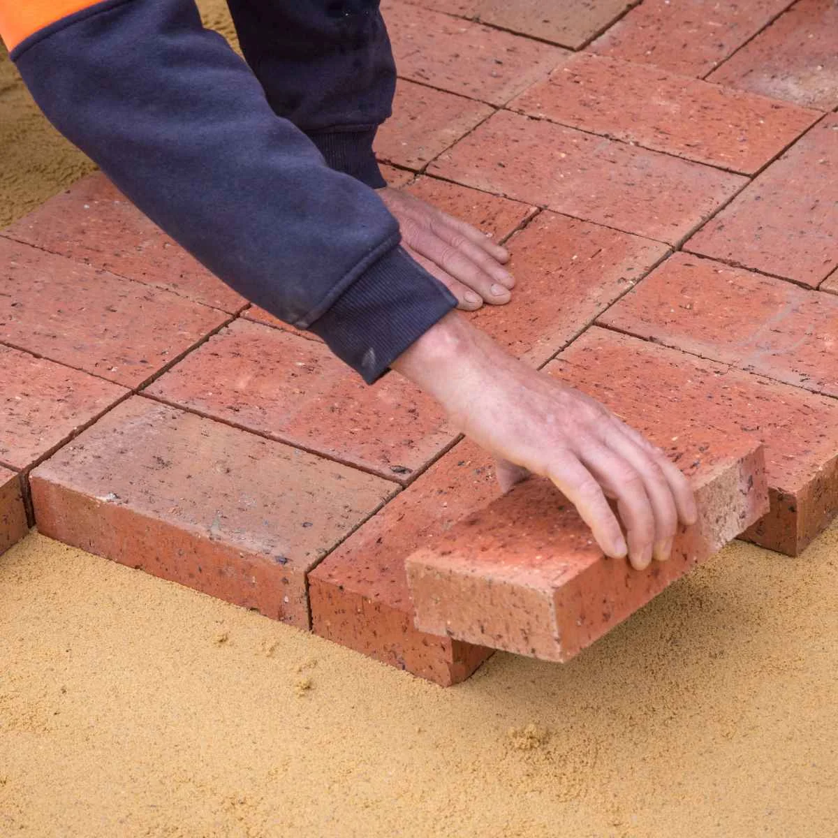 Natural stone patio with matching coping